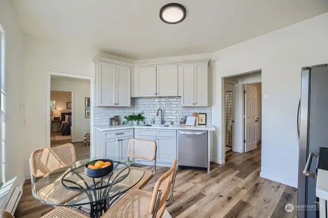 Well appointed eat-in kitched with updated cabinets, counters and stainless steel appliances.