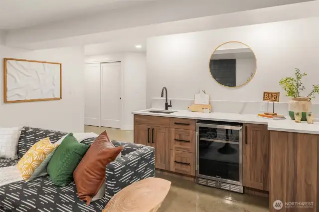 Wet bar with prep sink and temperature controlled wine fridge