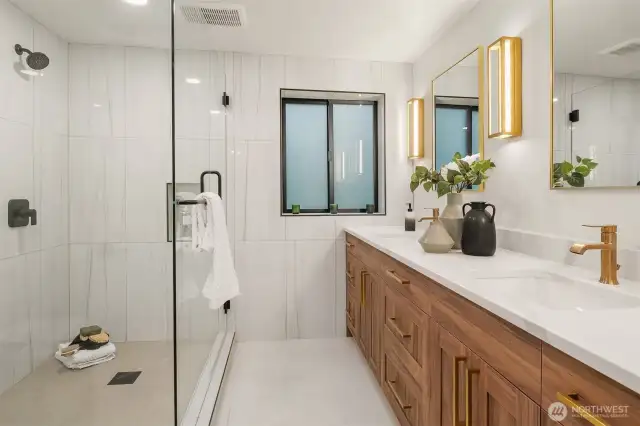3/4 bath on lower level serves an additional bedroom and den with clean, modern finishes
