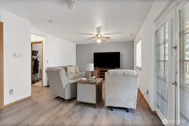 Family room off kitchen. Half bath to the left.
