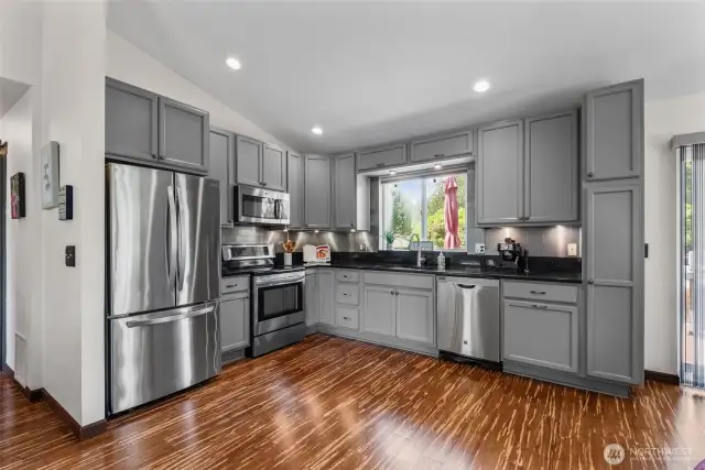 Gleaming new kitchen appliances and shiny countertops