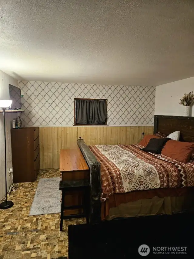 Primary bedroom - has door to outside as well as 2 closets and extra space!