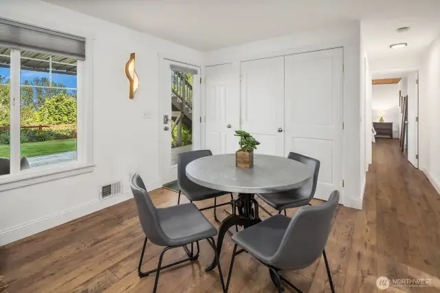 Dining space in downstairs. 2nd washer and dryer located in the closet.