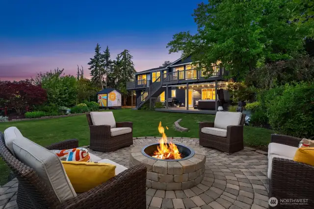 Spacious level yard with decks and patios that allow for optimal outside entertaining, including fire pit, hot tub , pizza oven and vegetable garden.