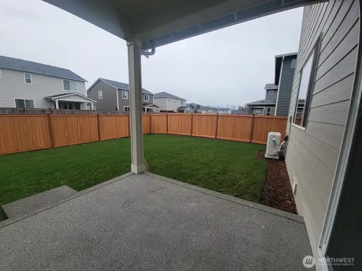 Covered Patio and backyard