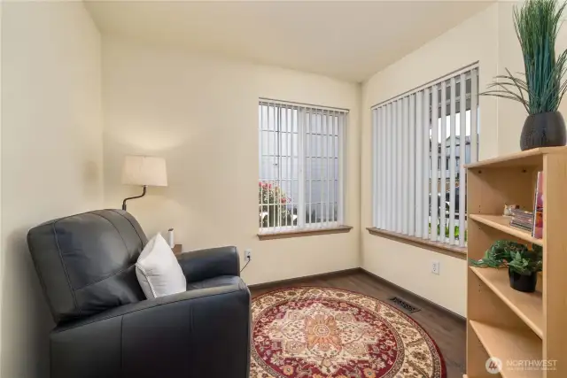 As you step inside, you'll immediately find an office/den to your right.