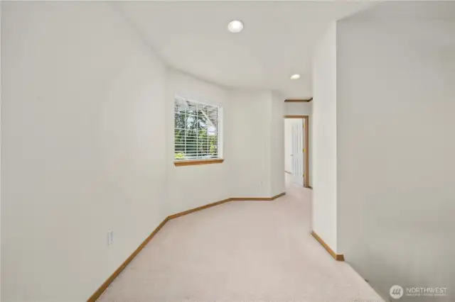 Upstairs, find a impressive primary and two additional spacious bedrooms.