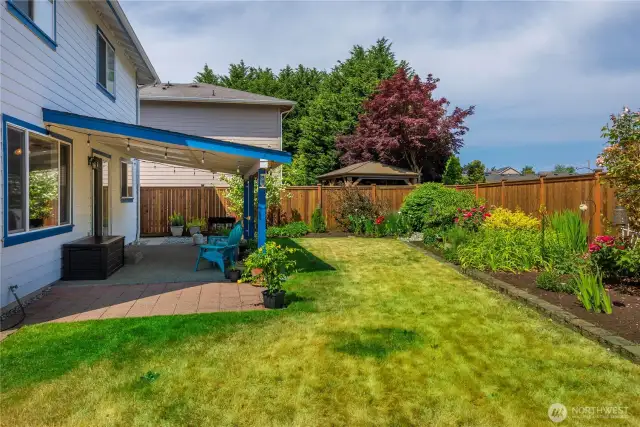 This backyard is perfect for those with a green thumb.