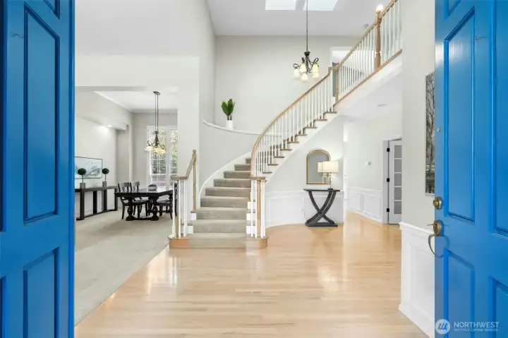 Soaring entry, offering a traditional layout with both formal and informal spaces