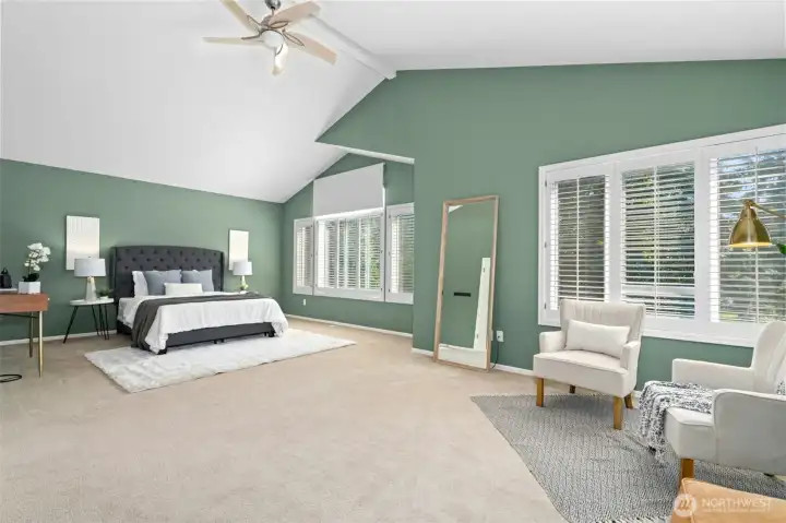 Spacious Primary Bedroom offers vaulted ceilings, mini-spilt A/C