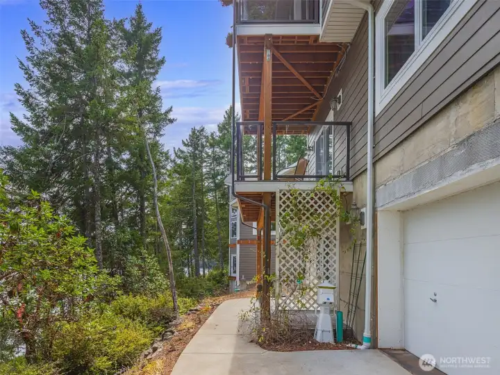 Access to outside from lower living area. Water equipment storage at right.