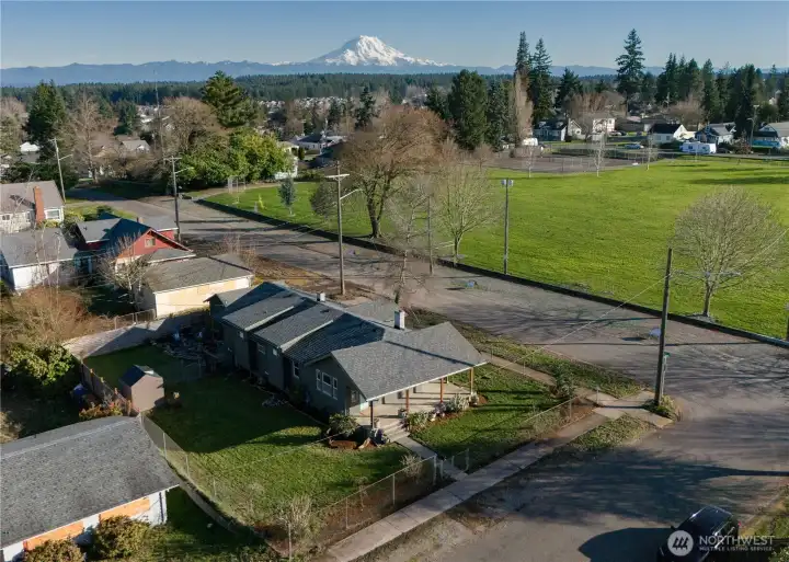 Morning coffee on your wrap around front porch, or walk over to the park for views of Mt Rainier.
