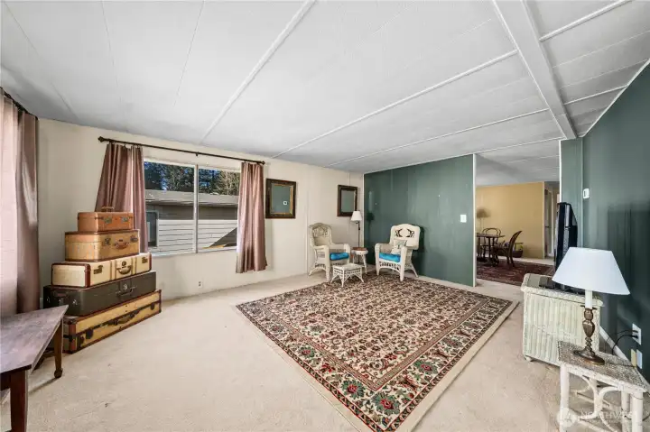 Versatile flex space offering room for gatherings, game nights, or additional entertaining area.