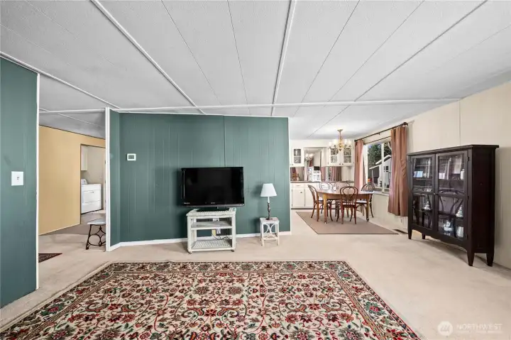 Expansive den offering a separate living space—perfect for watching a different show while others relax in the main living room.