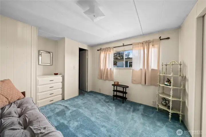 Secondary bedroom with great natural light—perfect for guests, hobbies, or a home office.