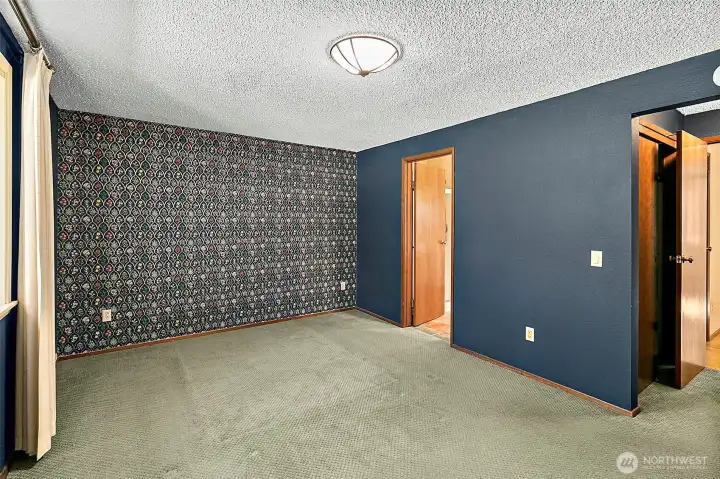 Primary bedroom has its own bathroom