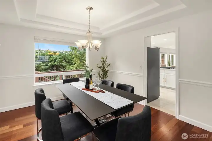 Dining area overlooks the private backyard and huge patio area.