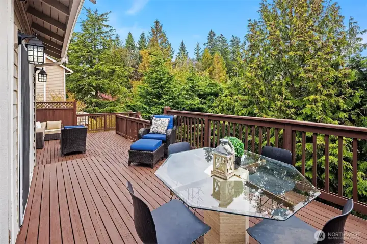 The deck runs the full length of the house, giving multiple spaces to dine alfresco, enjoy a morning coffee or a drink at the end of the day