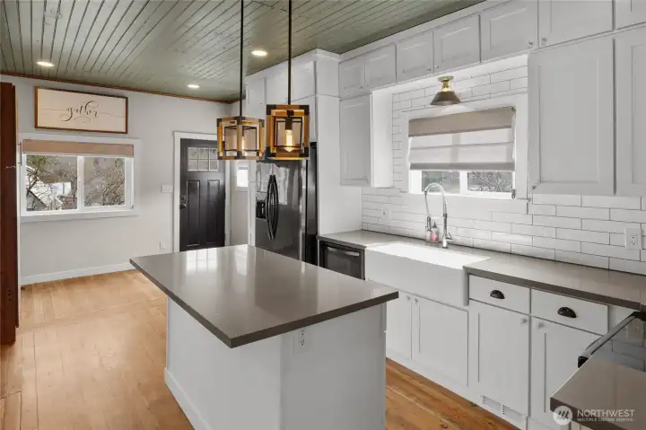 You can see front entry as you enter the home and immediately taken in this beautiful kitchen. For extra sleeping there is a well thought out murphy bed for those extra guest.