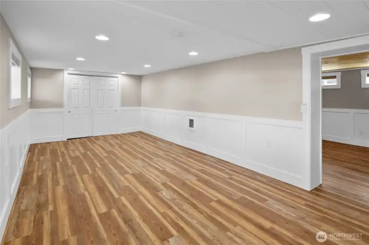 Another view of lower bedroom located at the bottom of the stairs. This massive room could also be used as a flex room, office, work out room - so much potential.