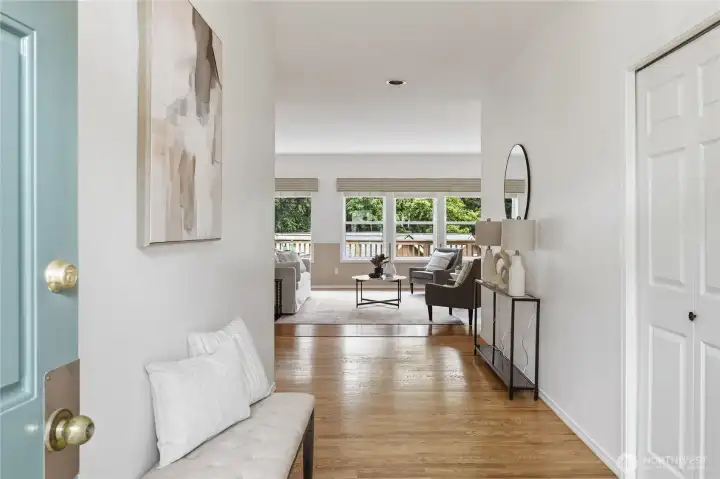 Main level living spaces have rich hardwood floors