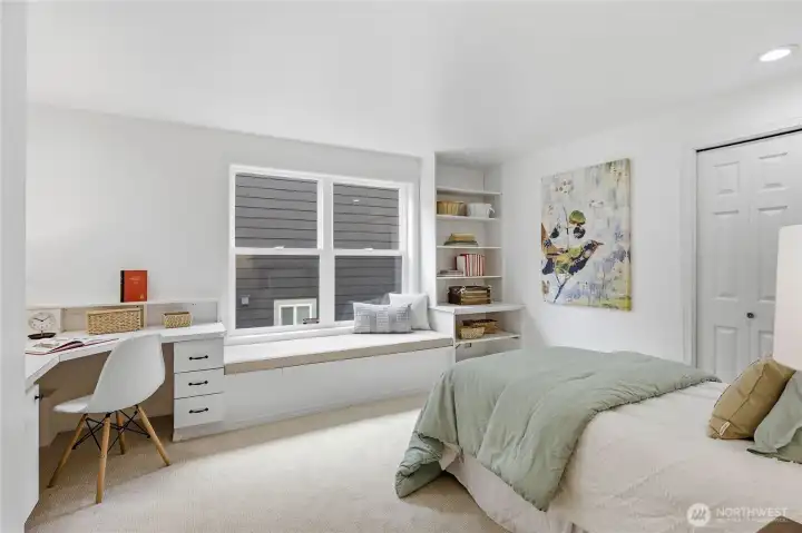 Bedroom 3 features a built-in desk and window seat