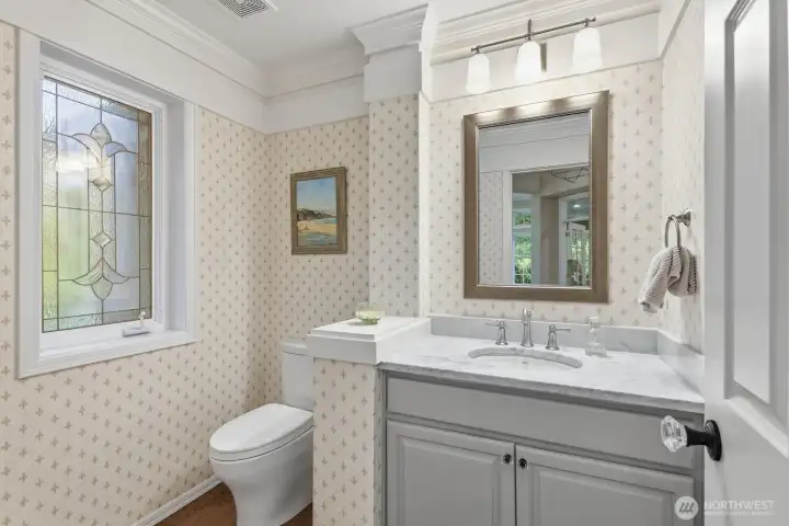 Powder room with updated countertops.