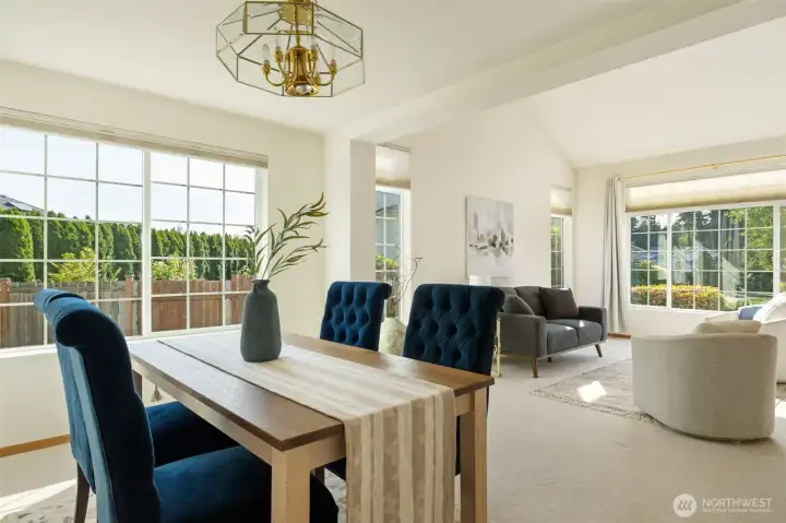 Formal dining sits just off the main living room