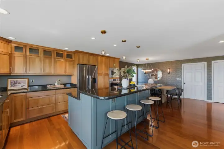The heart of the home is this gorgeous kitchen featuring custom cabinetry, granite countertops, and luxury appliances. The heart of the home is this gorgeous kitchen featuring custom cabinetry, granite countertops, and luxury appliances.