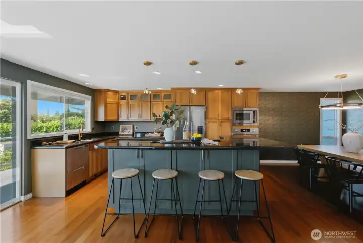 Entertain with ease in a kitchen designed for both functionality and gathering. Entertain with ease in a kitchen designed for both functionality and gathering.
