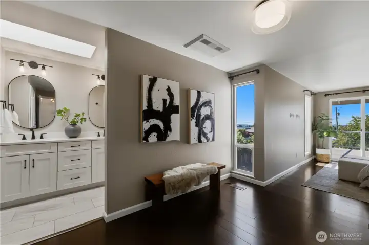 Back inside, retreat to the serene primary suite featuring Brazilian oak floors and floor-to-ceiling windows that frame the views. Back inside, retreat to the serene primary suite featuring Brazilian oak floors and floor-to-ceiling windows that frame the views.