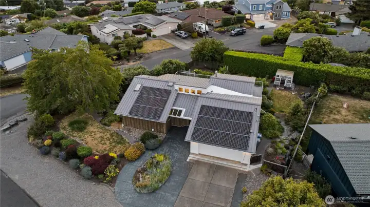 Modern conveniences abound, including solar panels, whole-home ethernet, USB-C chargers and dimmers in every room, an EV charger in the garage, an exterior EV outlet, a TT-30 outlet, and dual 300-amp panels. Modern conveniences abound, including solar panels, whole-home ethernet, USB-C chargers and dimmers in every room, an EV charger in the garage, an exterior EV outlet, a TT-30 outlet, and dual 300-amp panels.