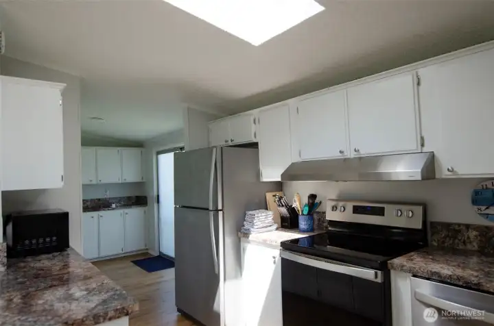 Spacious kitchen with breakfast room off of one end.