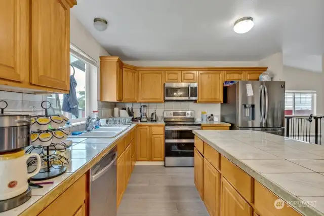 Stainless appliances complement this kitchen.