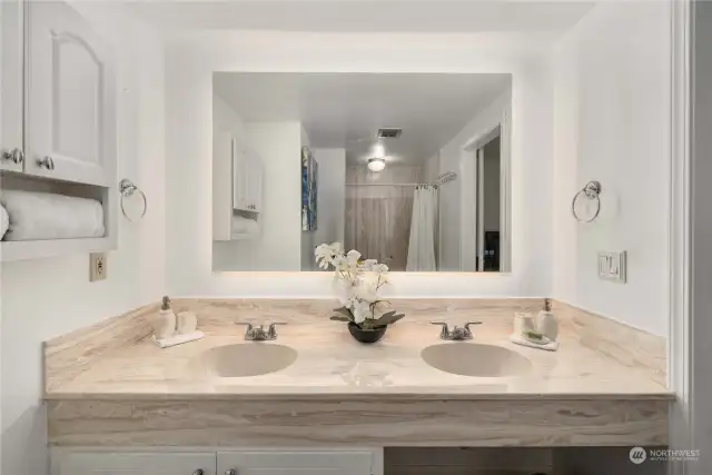 Primary bath with a double vanity. Everything in this house is fresh and new, just waiting for you.