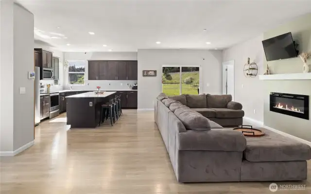 Living room is open to the kitchen and dining area.