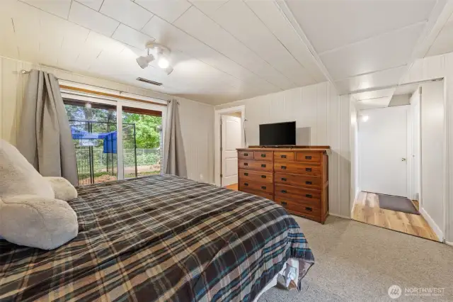 Door to left of dresser goes to WIC with sink)