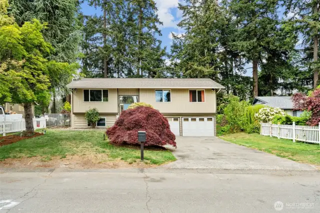 Extra long driveway (appx 25') and room for RV parking to the right.