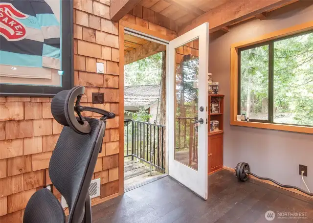 Front door of tree house. Tree house features 3 decks.