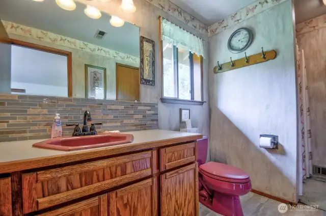 Primary bathroom has hallway access