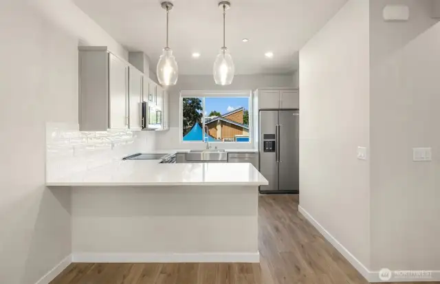 Picture is of a similar home in the community.