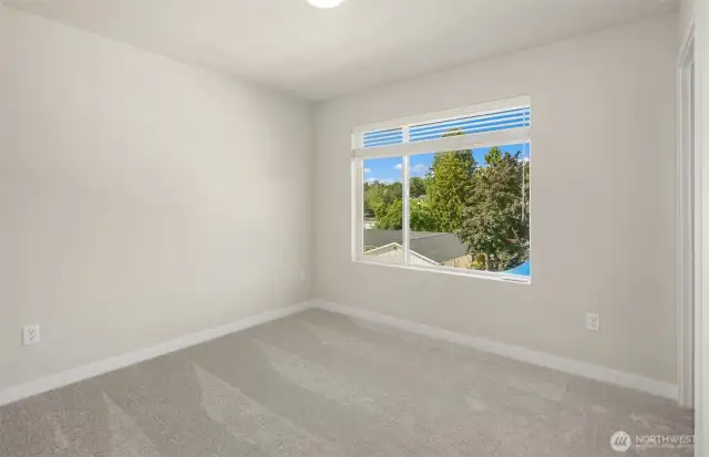 Picture is of a similar home in the community.
