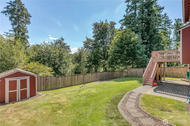 Backyard with storage shed the has electrical