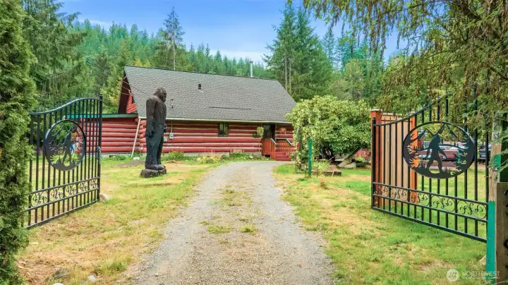 Nestled in the Granite Falls foothills, this two-story tamarack log cabin was once home to the author of Bigfoot: Myth or Reality. Bigfoot greets you at the gates and stands watch at the entrance, setting the tone for a property like no other.