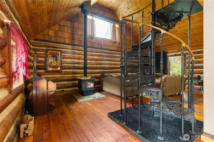From the firelight to the hand-crafted details, this view captures what makes the cabin unique: a true blend of history, artistry, and everyday livability.