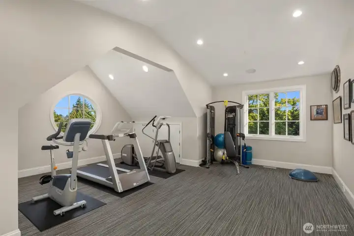 A home gym and spa bath complete the additional home amenities.