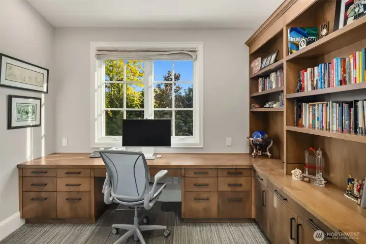 The perfect office space nestled above the garage providing flexibility.