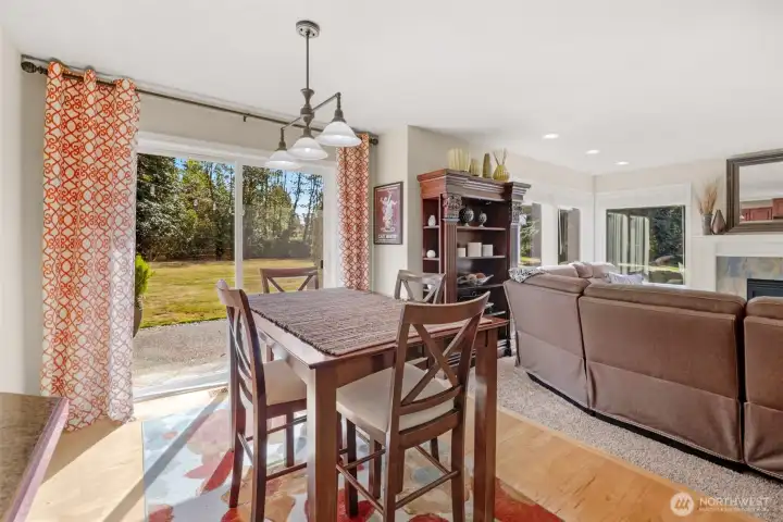 Kitchen eating area with slider to back patio area