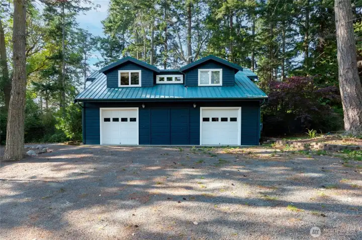 3+ car garage with bonus space above.