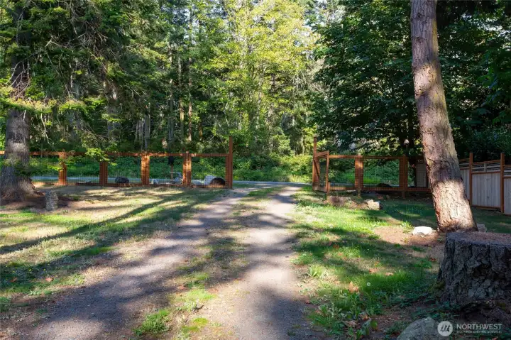 Fully fenced property with a dog run.